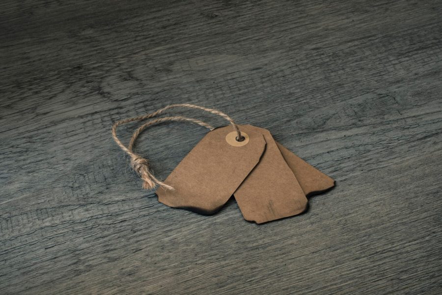 Engraved Tags vs Printed Labels: Which Lasts Longer?